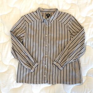 Lee button down blouse. Cute narrow cuffs. Feminine mini-pleats across back.